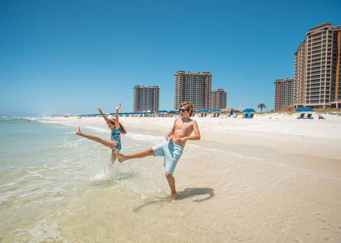 Kids playing in the water on Pensacola Beach