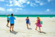 Friends enjoying a beach day on Pensacola Beach